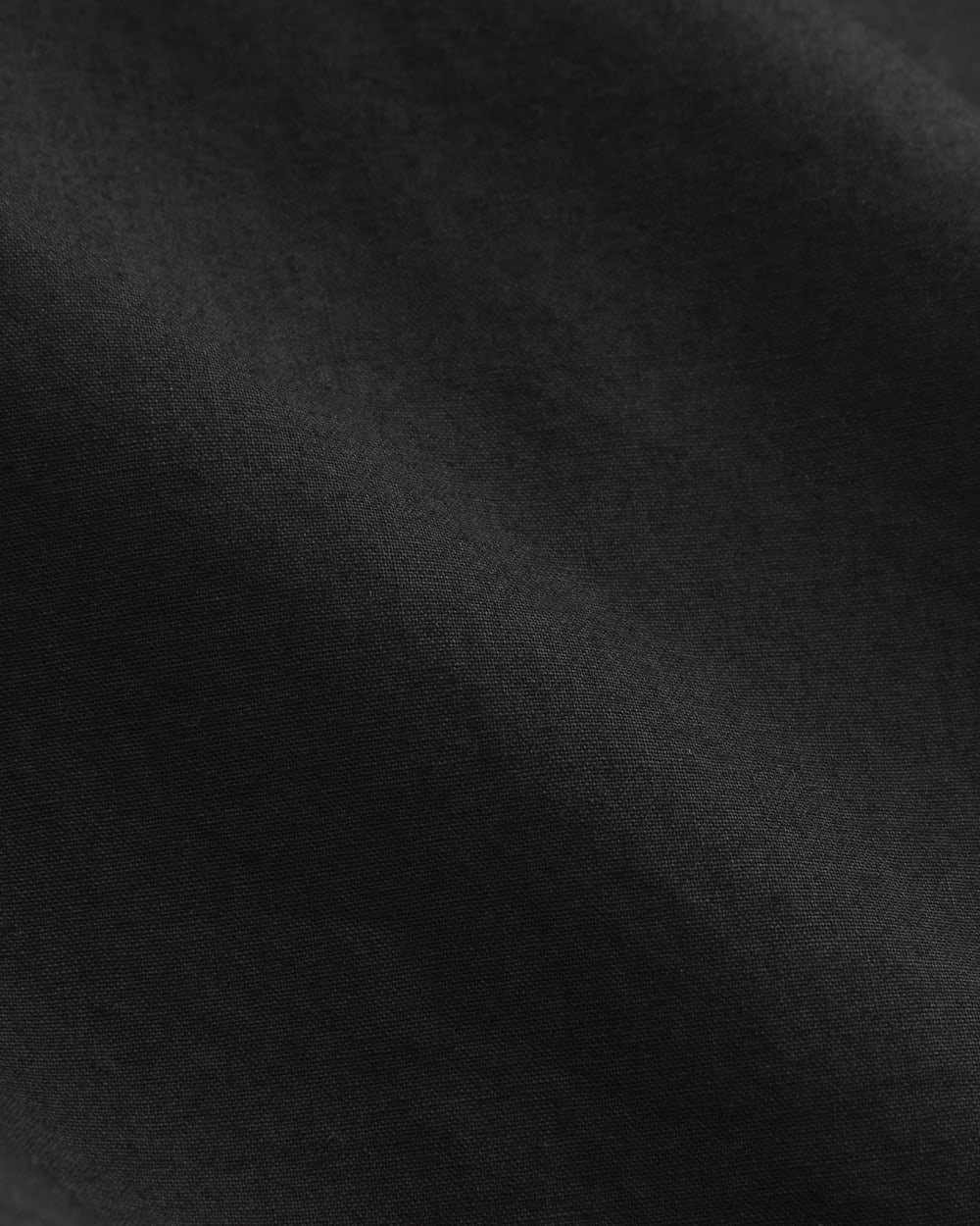 The Lace Trim Tank in Black — detail view