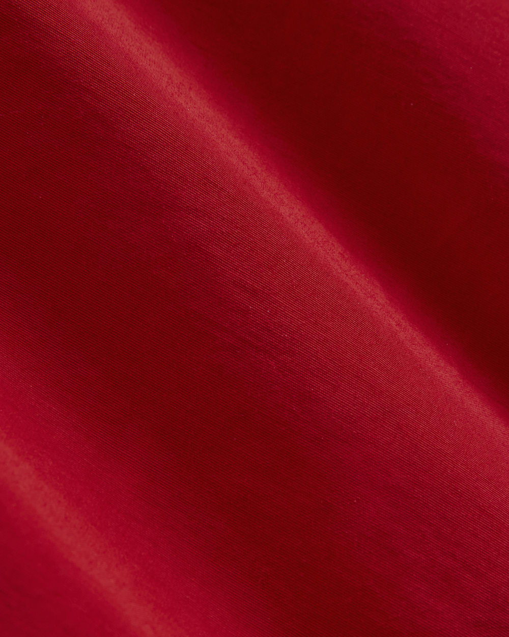 The Short Anorak in Berry Red — detail view