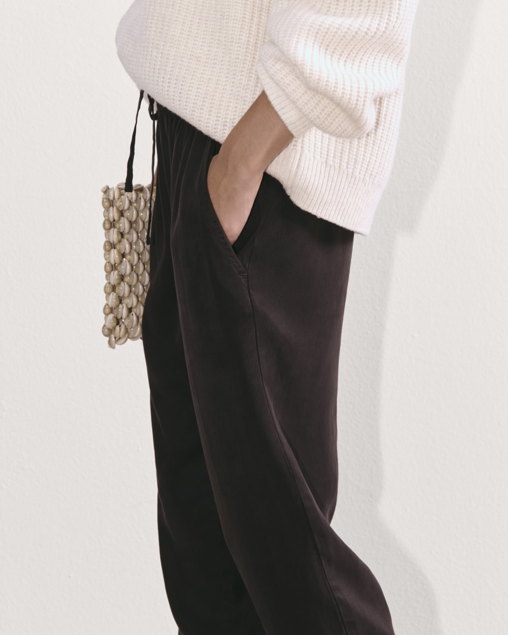 The Tapered Pant in Butterlite in Black — detail view