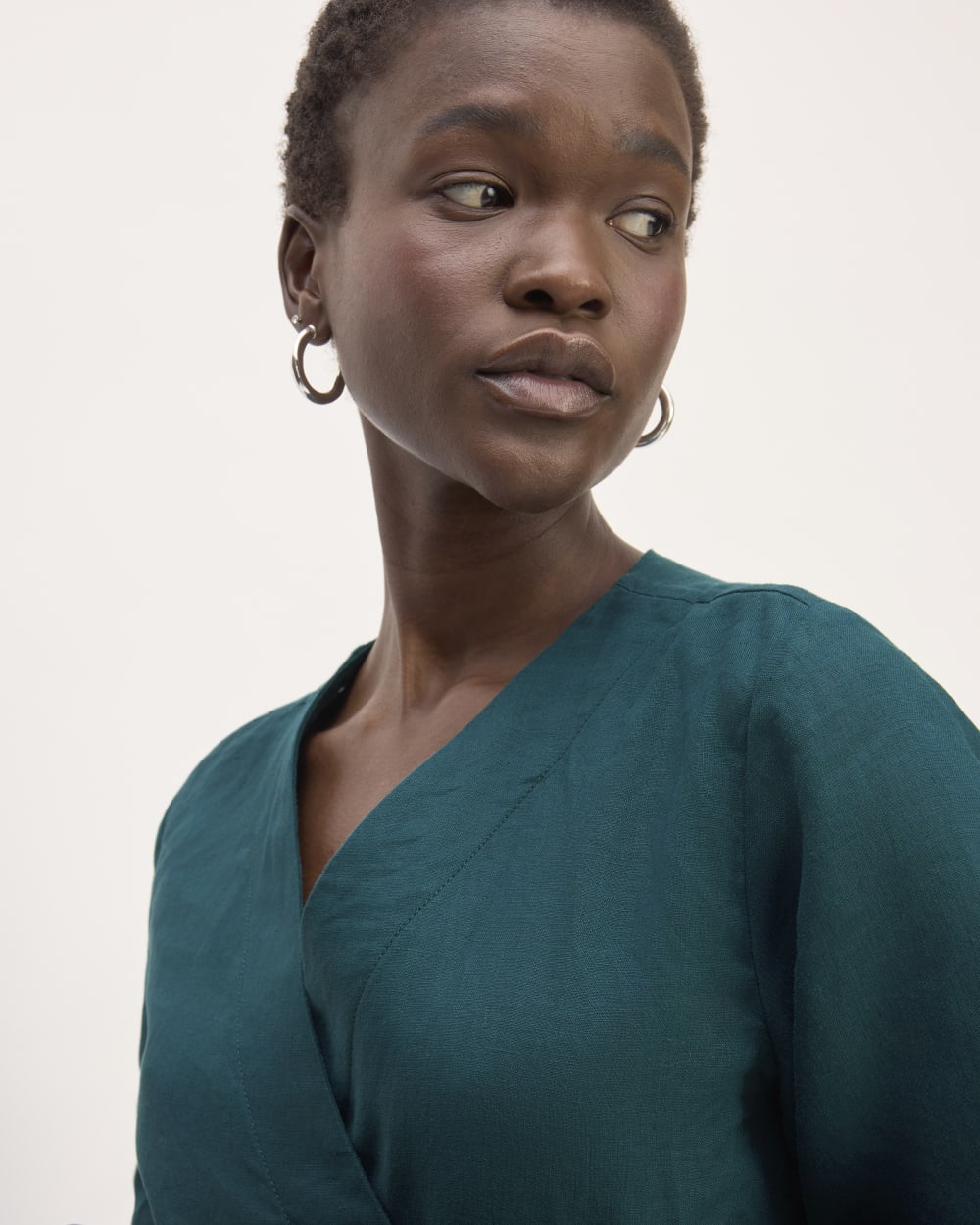 The Wrap Dress in Linen in Dark Sea — detail view