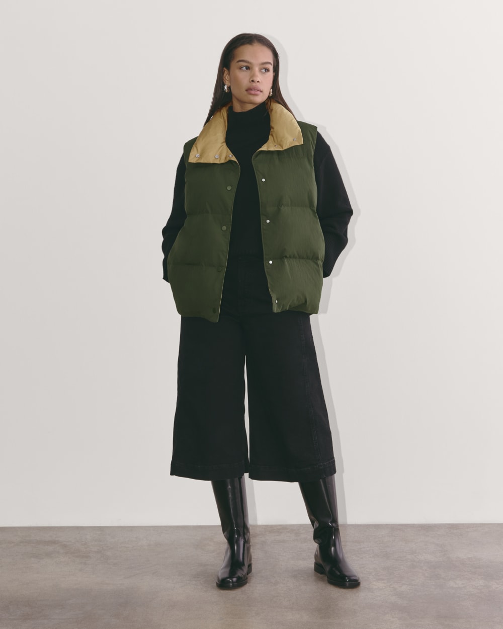The Puffer Vest in Dark Forest — detail view