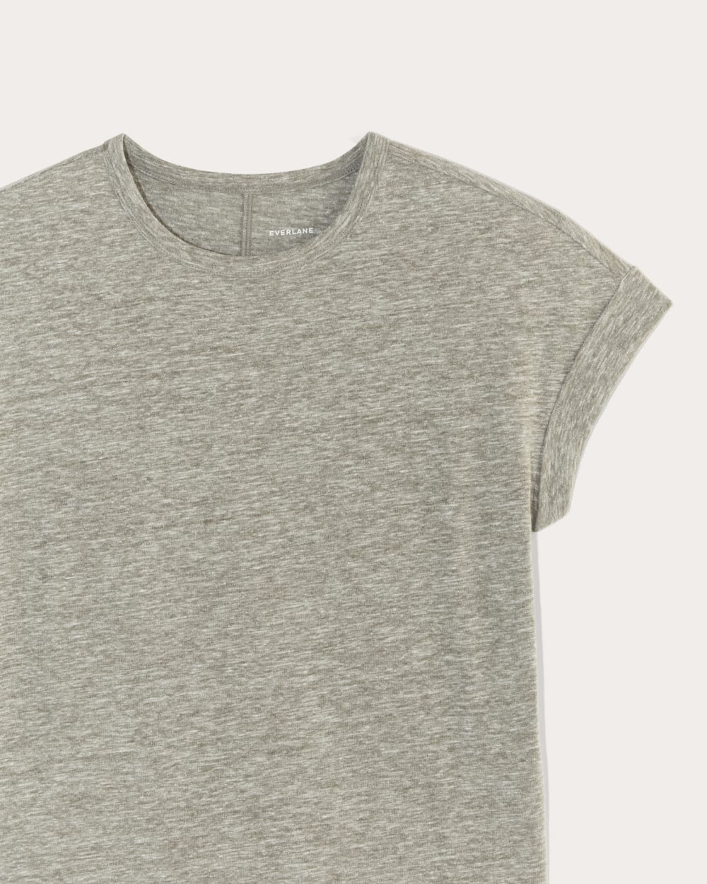 The Perform Tee in Heathered Grey / Olive — detail view