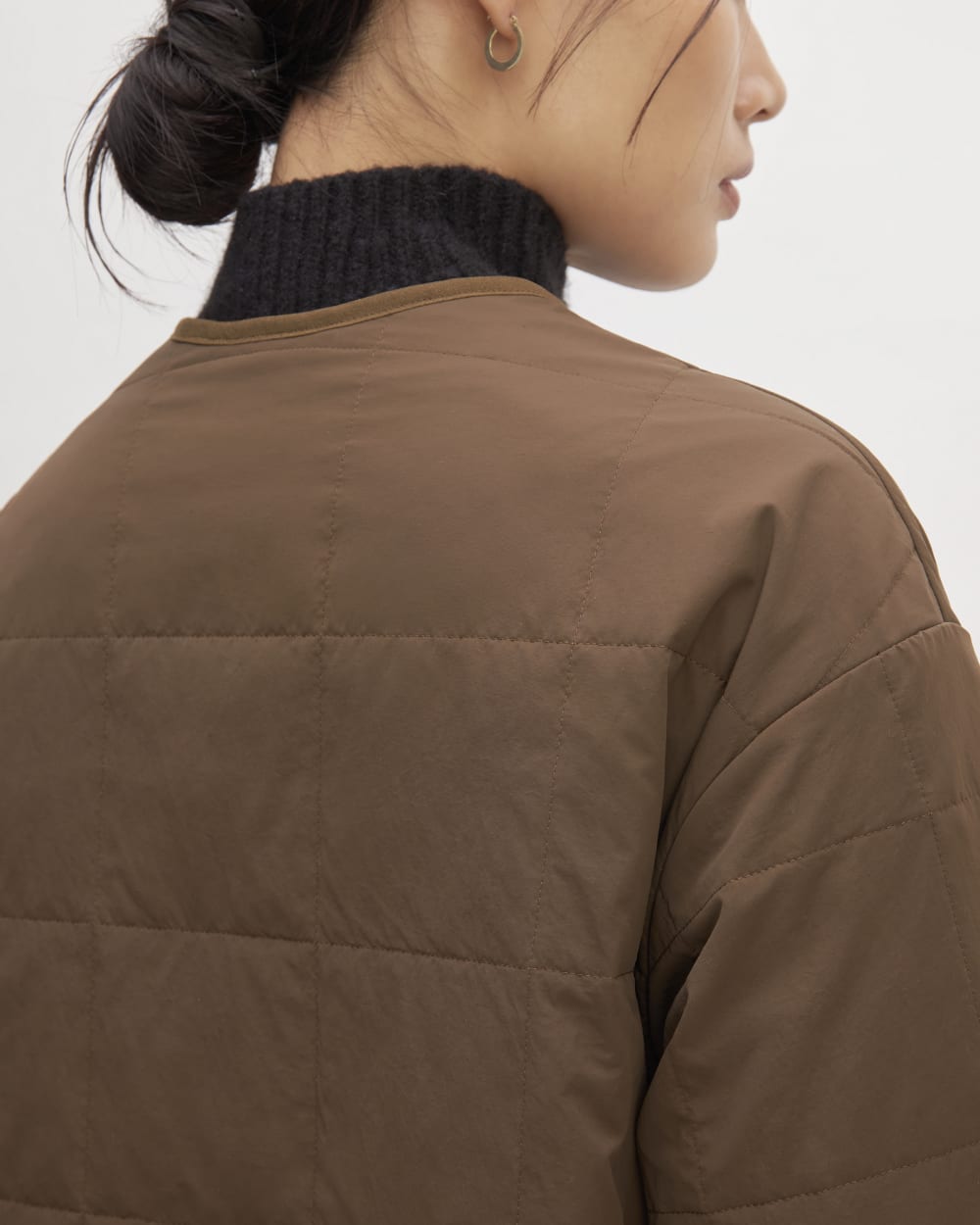 The ReNew Quilted Long Liner in Cocoa — detail view