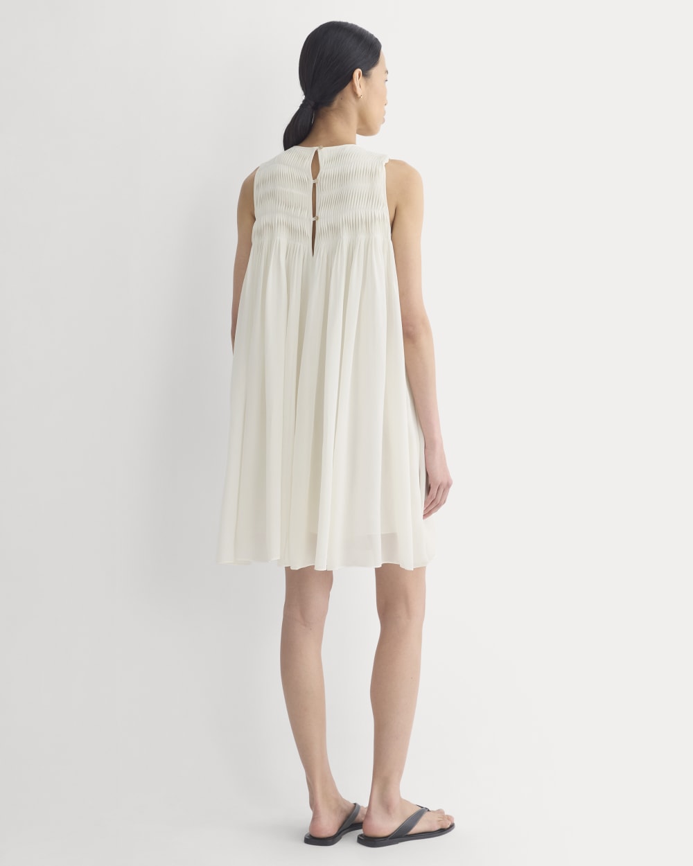 Twisted Pleated Mini Dress in Silk Georgette in Bone — detail view