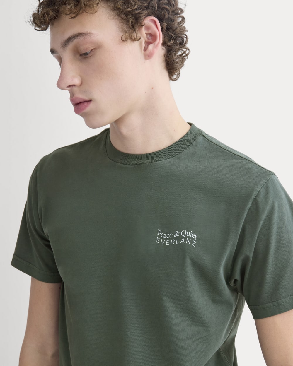 Everlane x Peace & Quiet Graphic Logo Tee in Pine — detail view