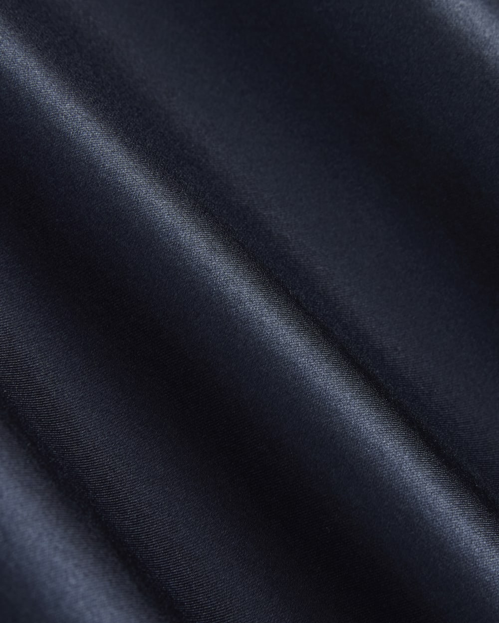 Slip Skirt in Silk Charmeuse in Navy — detail view