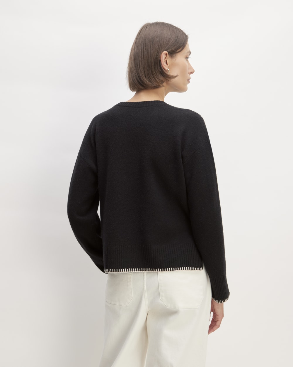 The Good Merino Wool Crewneck Sweater in Black / Buttermilk — detail view