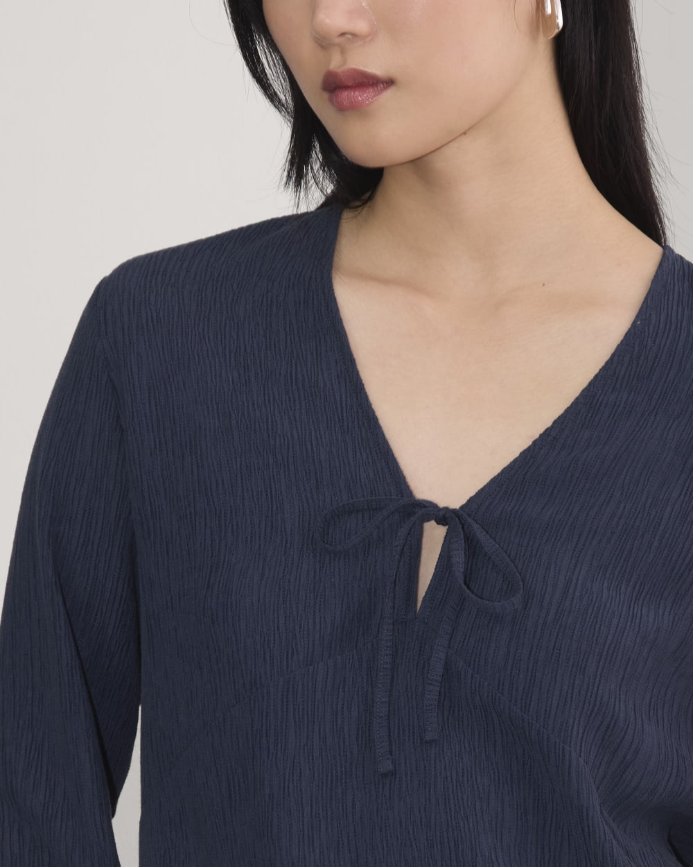 The Crinkle Long-Sleeve in Navy — detail view
