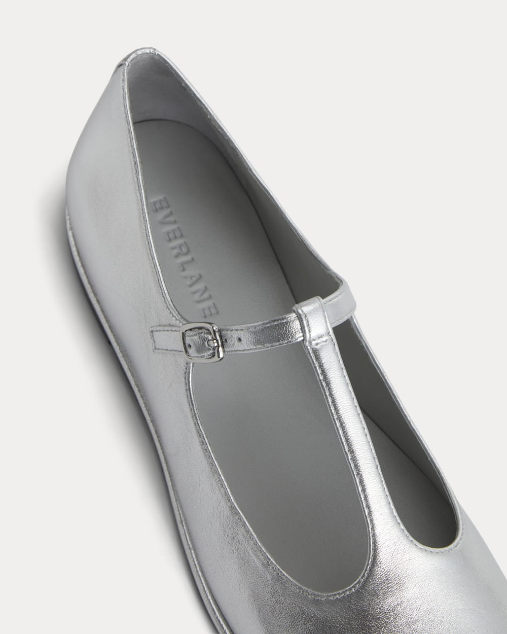 The Leather T-Strap Flat in Silver — detail view