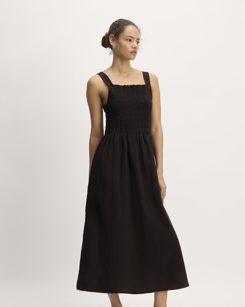 The Gauze Smock Dress in Black — front view