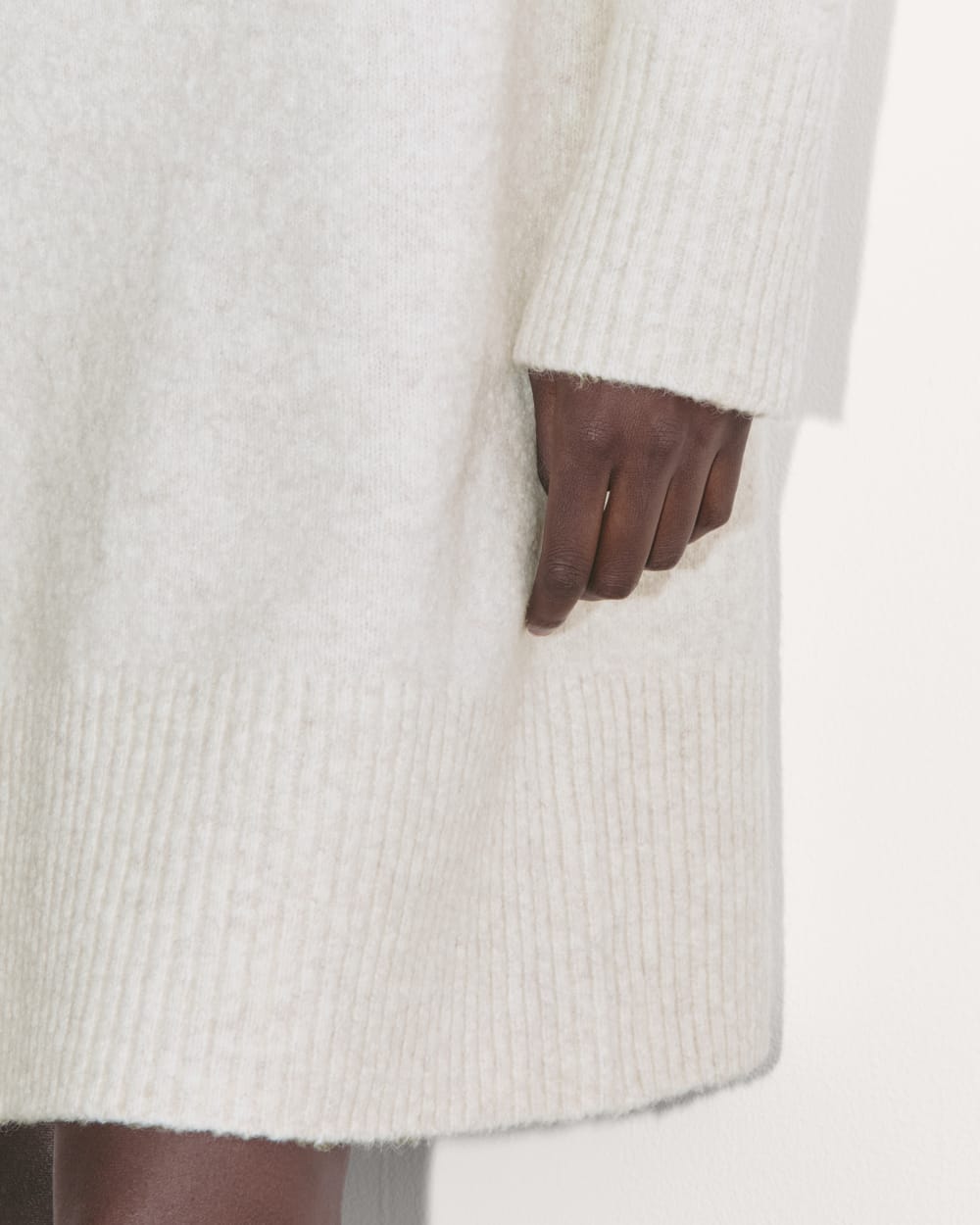 The Sweater Dress in Plush Cotton in Heathered Oat — detail view