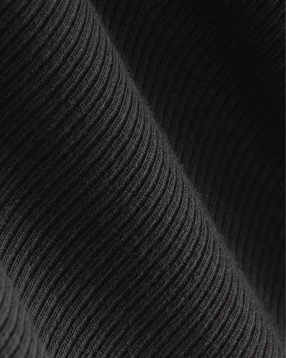 The Luxe Rib Funnel-Neck Tank in Black — detail view