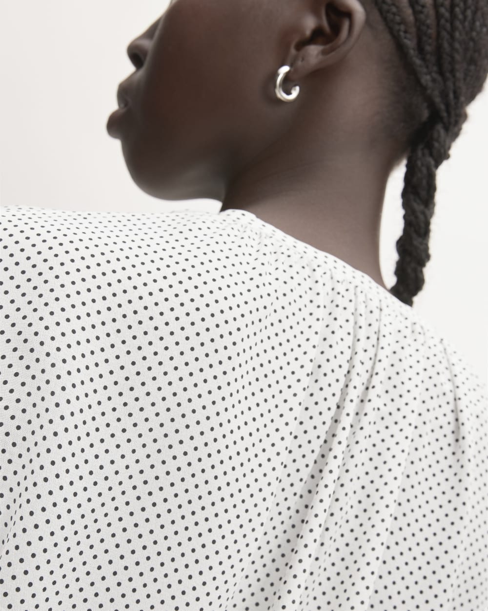 The Washable Clean Silk Shirred Blouse in Bone / Black Polka Dot — detail view