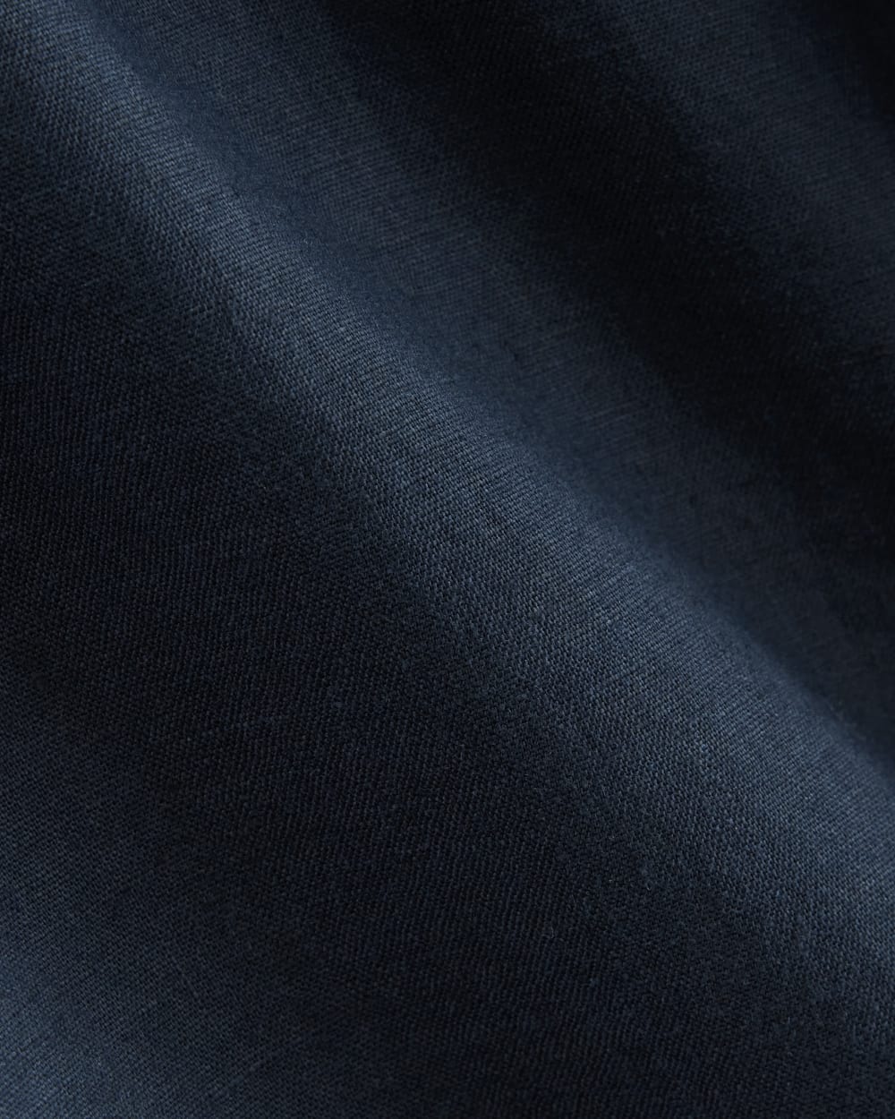 The Craft Dress in Linen in Navy — detail view