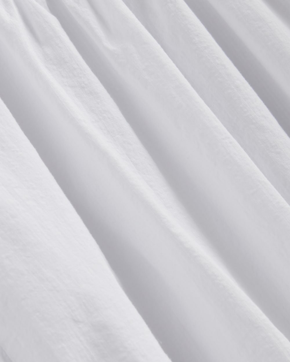 The Gauze Puff-Sleeve Top in White — detail view