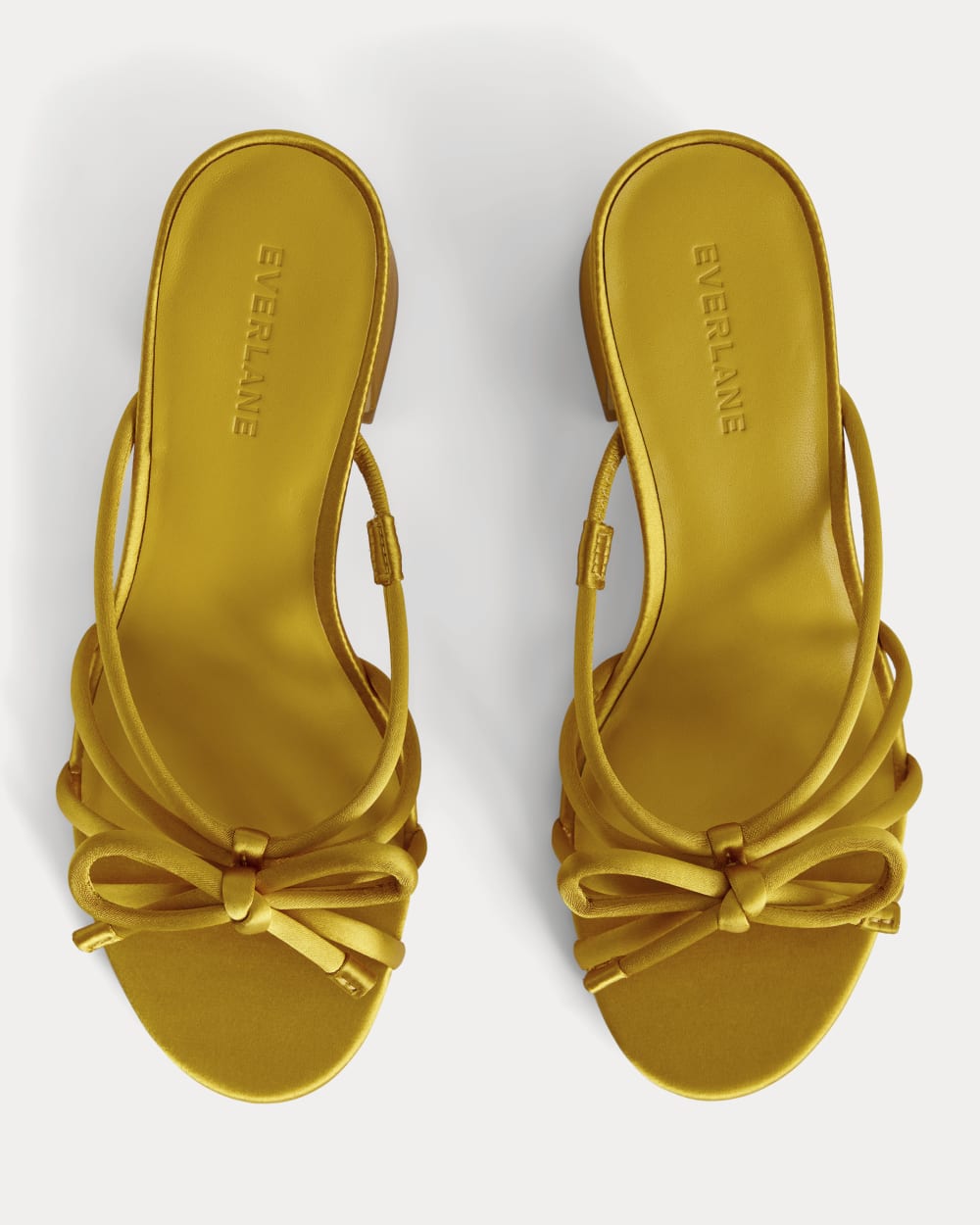 The Bow Heel in Golden Sun Satin — detail view