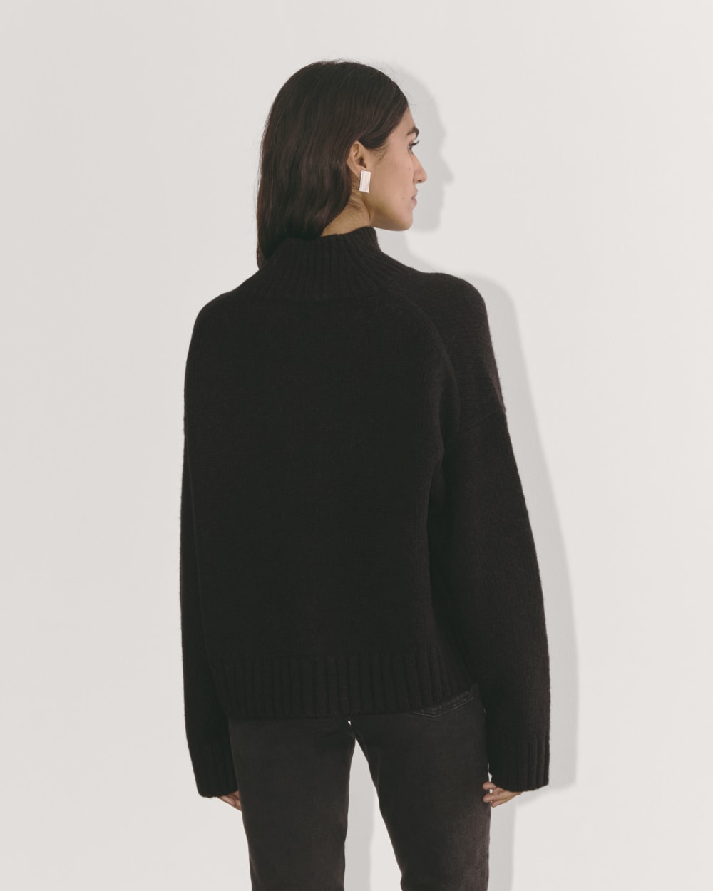 The Cloud Oversized Turtleneck in Black — detail view