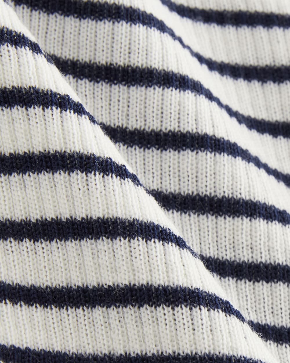 The Sweater Tee in Ultrasoft Merino in Bone/Navy — detail view