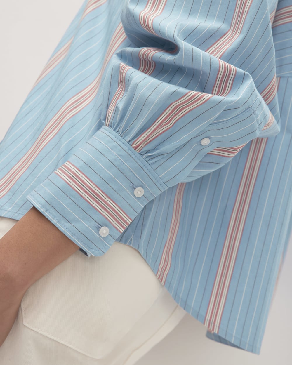 The Oversized Raglan Shirt in Parisian Blue / Black / Rusted Red / Bone — detail view
