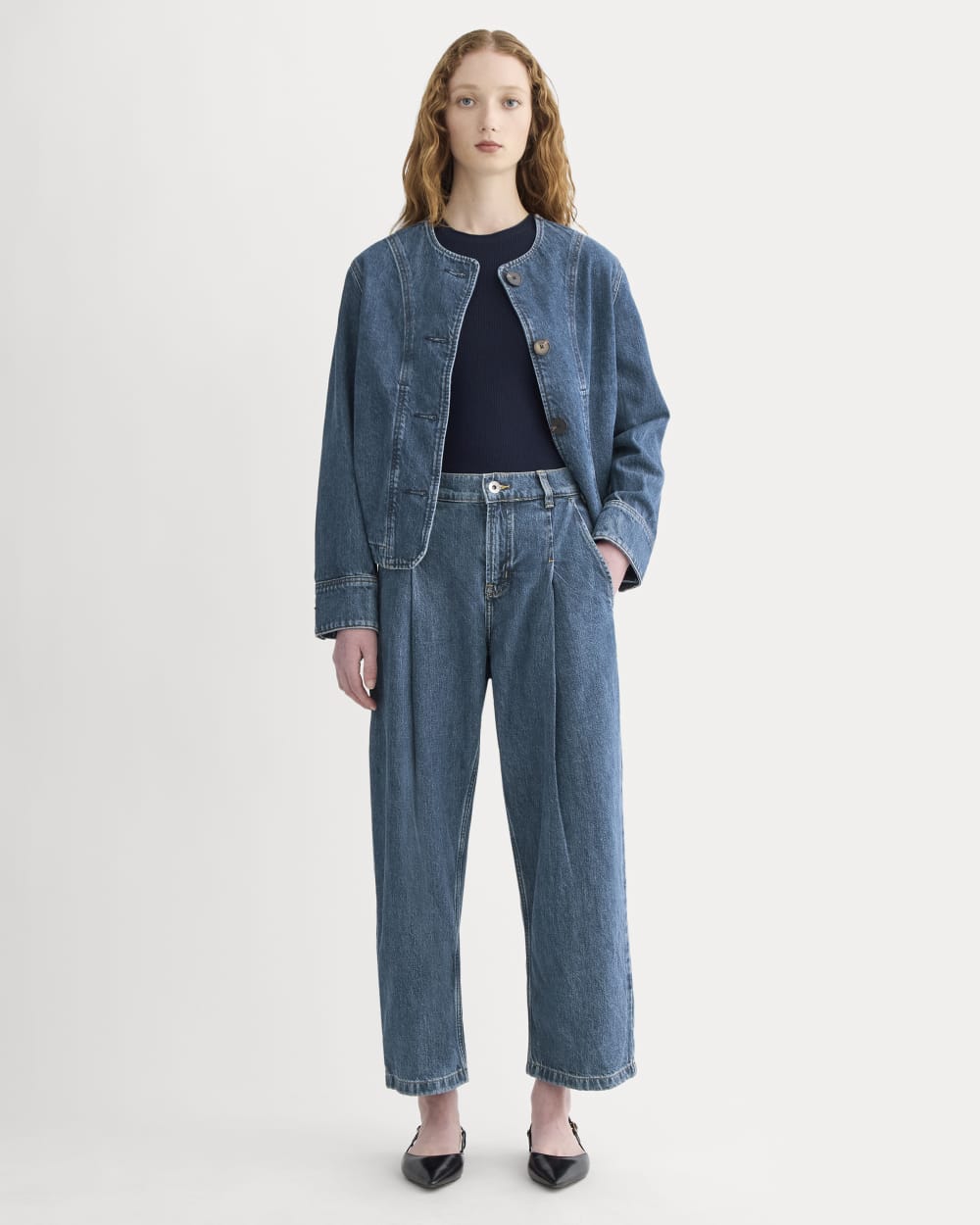The High Rise Pleated Jean in Mid Indigo — front view