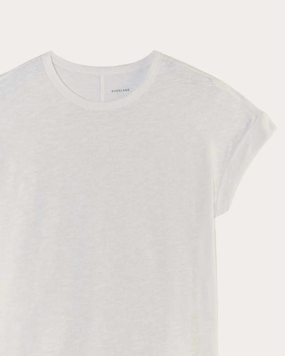 The Perform Tee in White — detail view