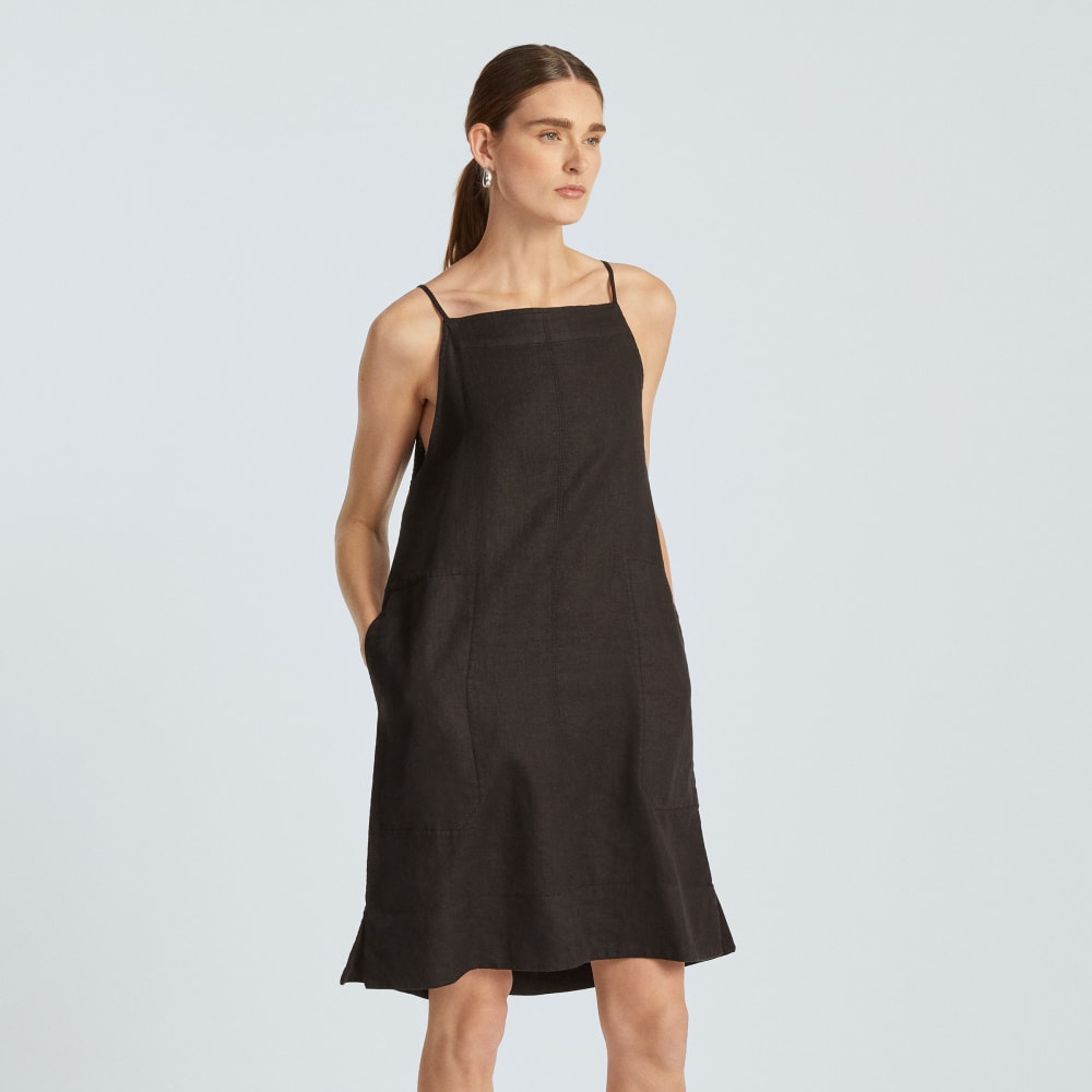 The Linen Apron Dress in Black — detail view