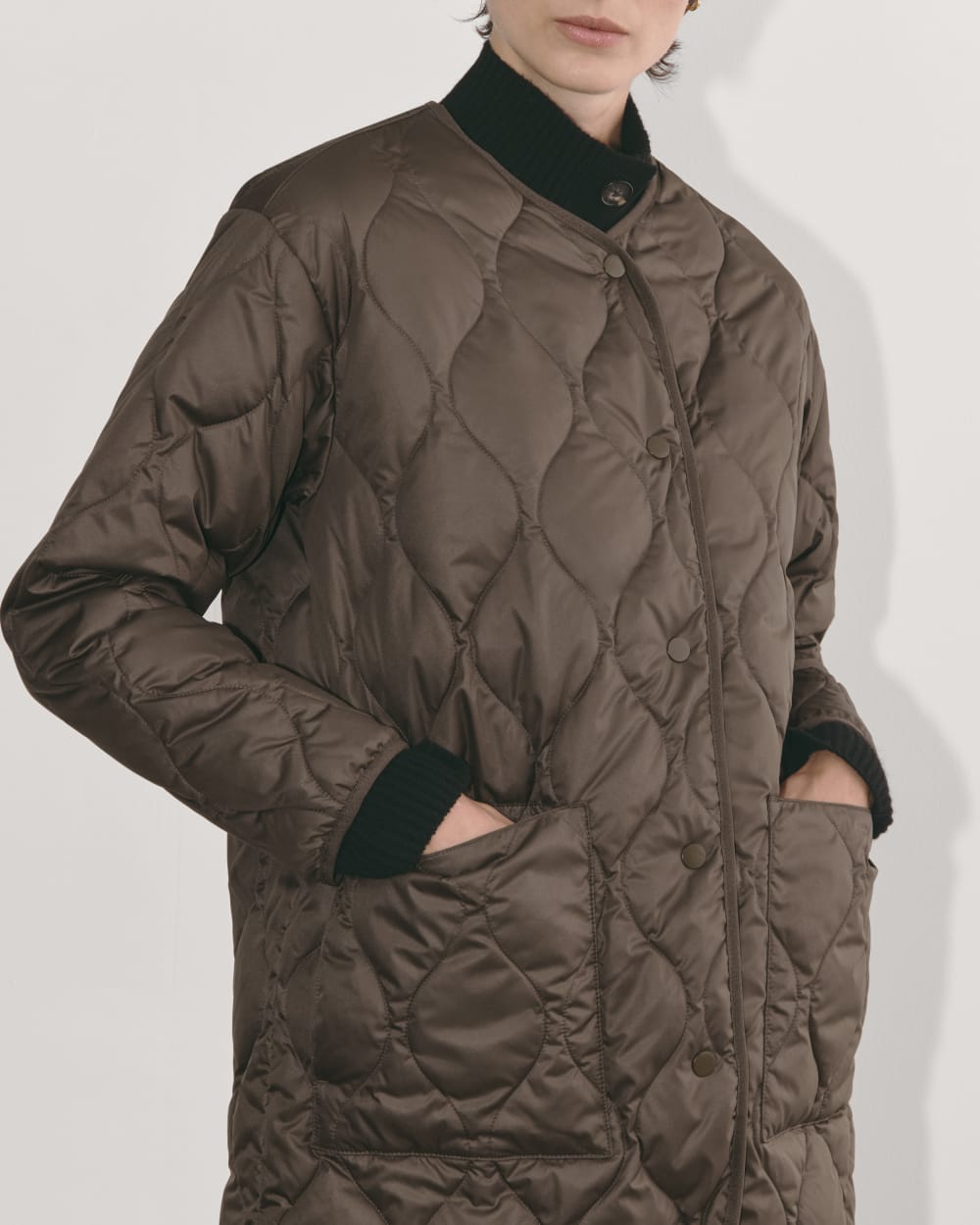 The Quilted Liner in Earth Brown — detail view