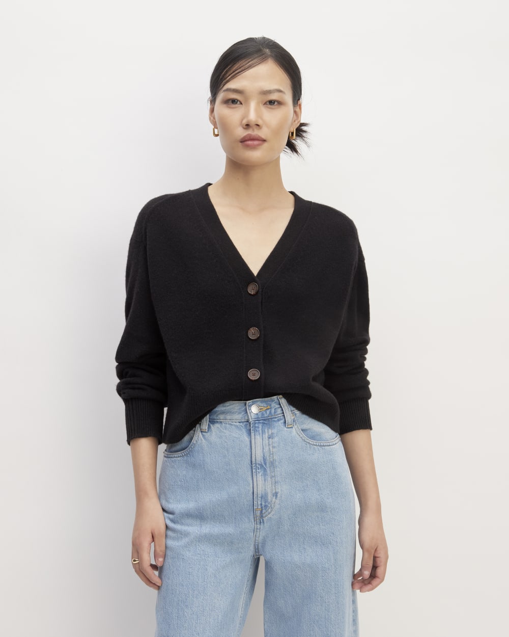 The Cashmere Cardigan in Black — front view