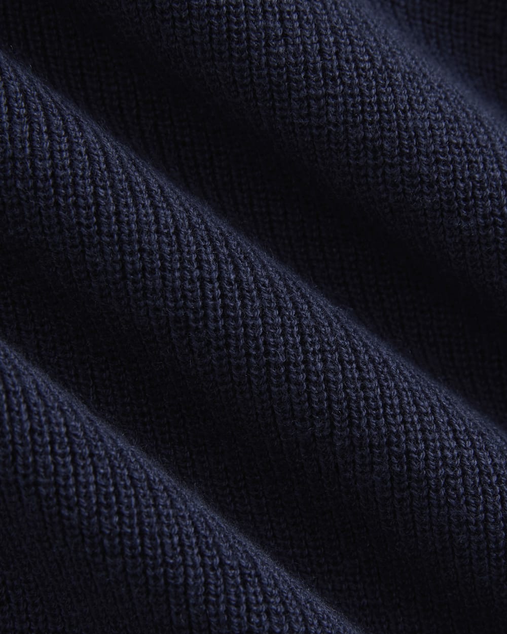 Relaxed V-Neck Midi Sweater Dress in Cotton Merino in Navy — detail view