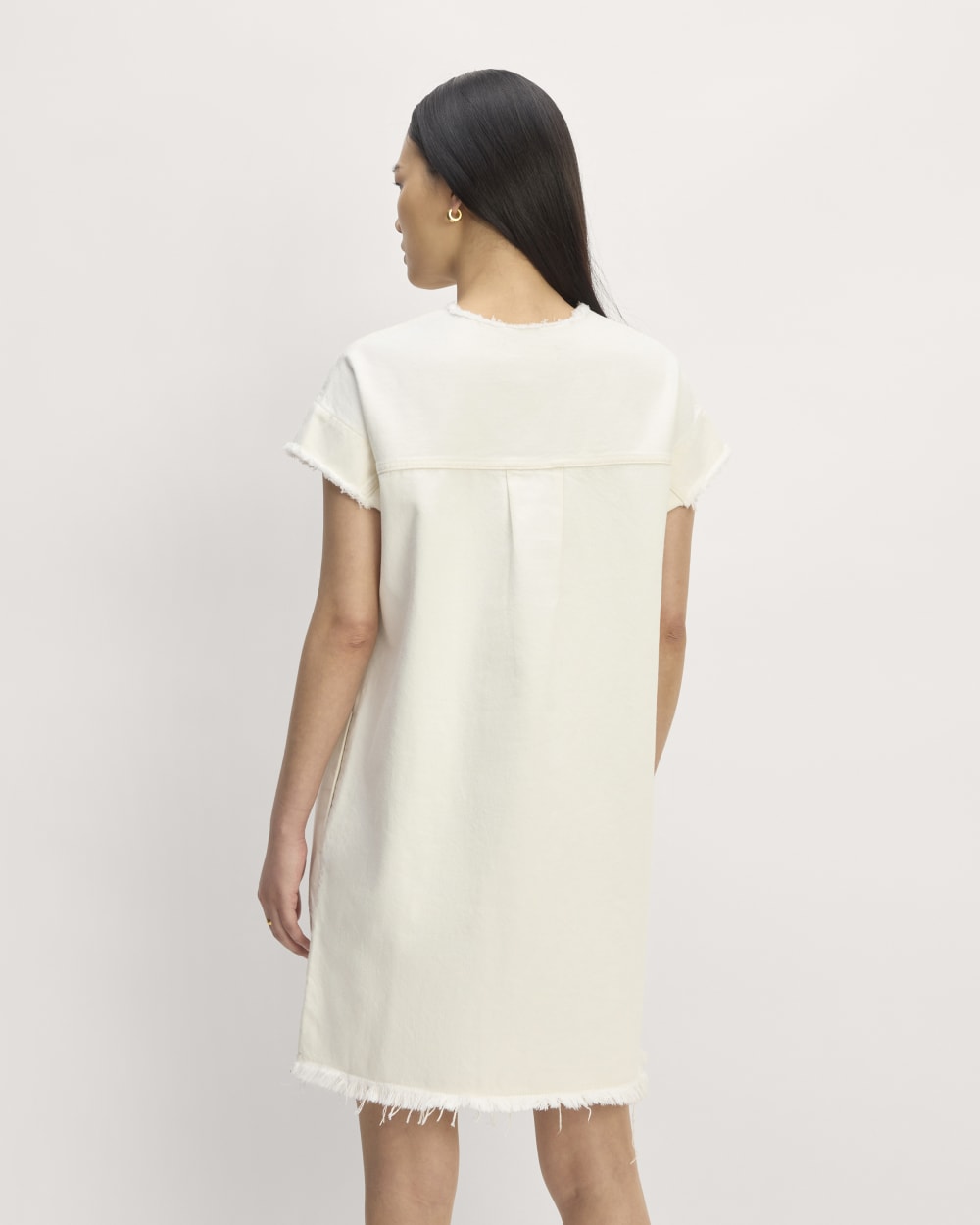 The Denim Workwear Shirtdress in Frayed Hem Bone — detail view