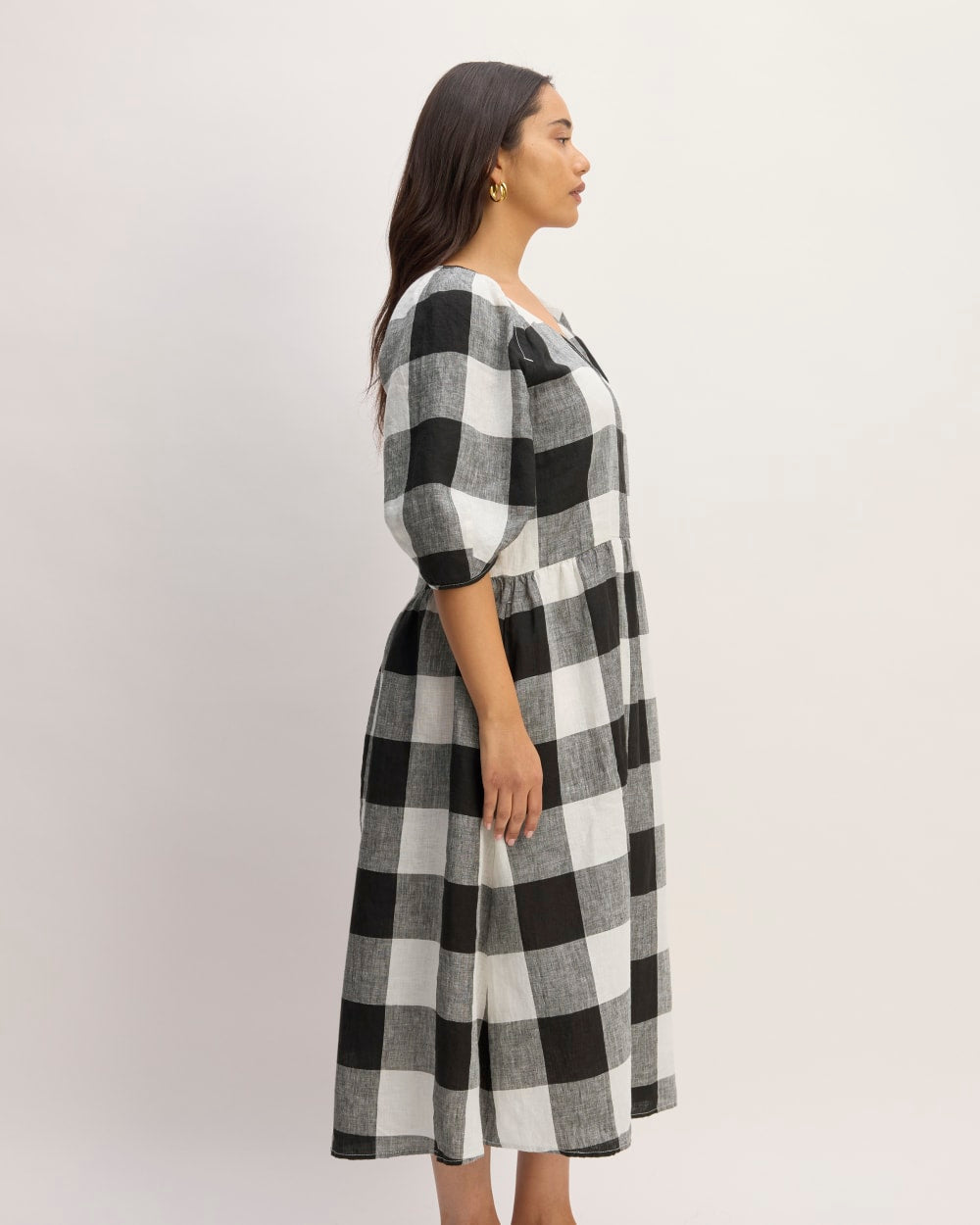 The Linen Oversized Puff-Sleeve Dress in Bone / Black Check — detail view