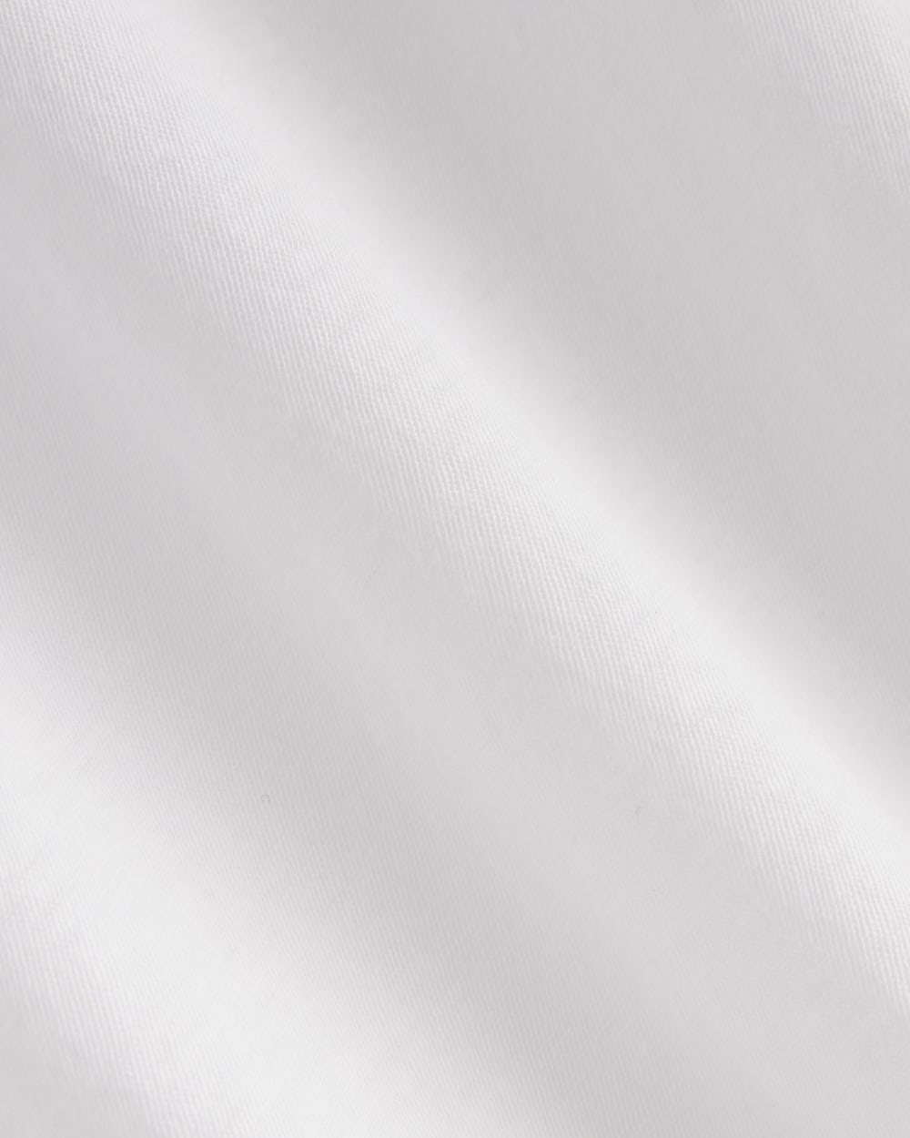 The Slim Air Tee in White — detail view
