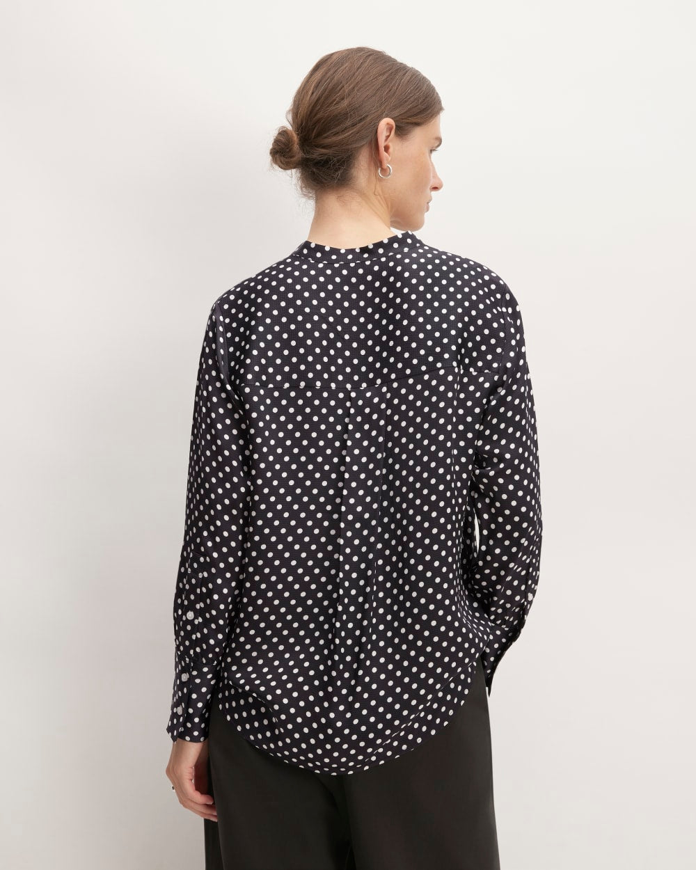 The Hammered Satin Popover Shirt in Black / Bone Polka Dot — detail view