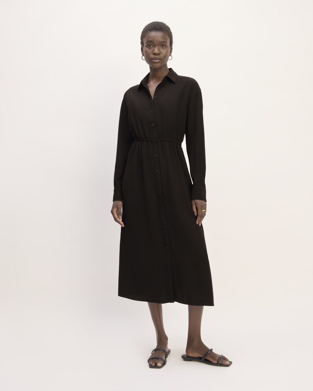 The Mini Jacquard Stripe Shirt Dress in Black — front view