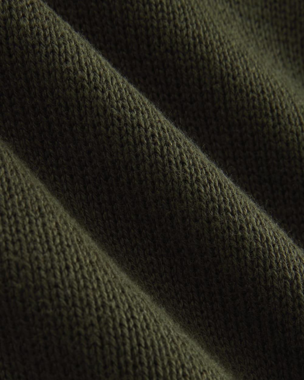 The Boxy Turtleneck in Everyday Cotton in Dark Green — detail view