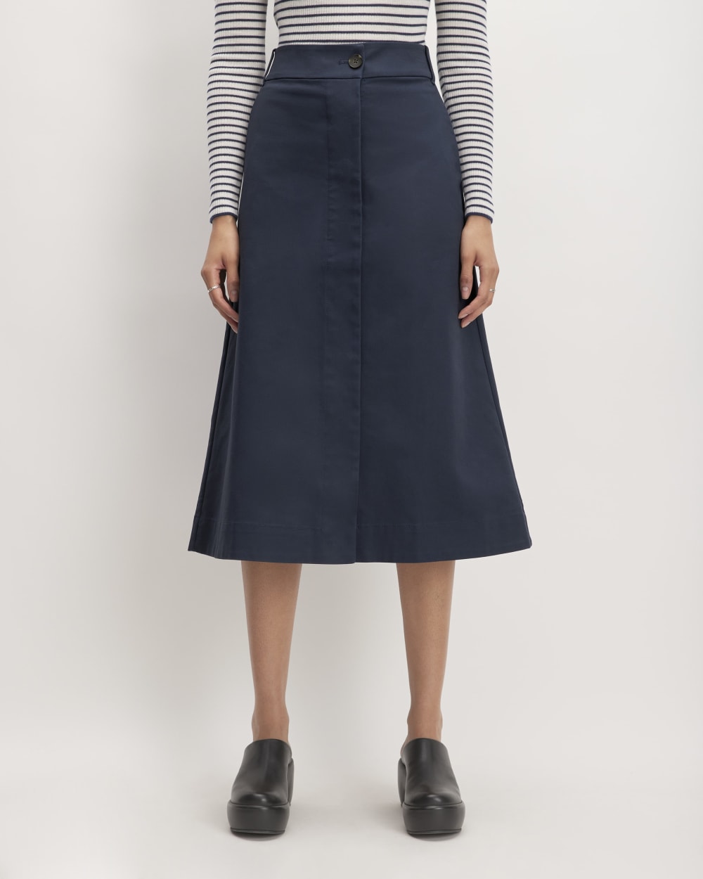 The Structured Cotton A-Line Skirt in Navy — front view