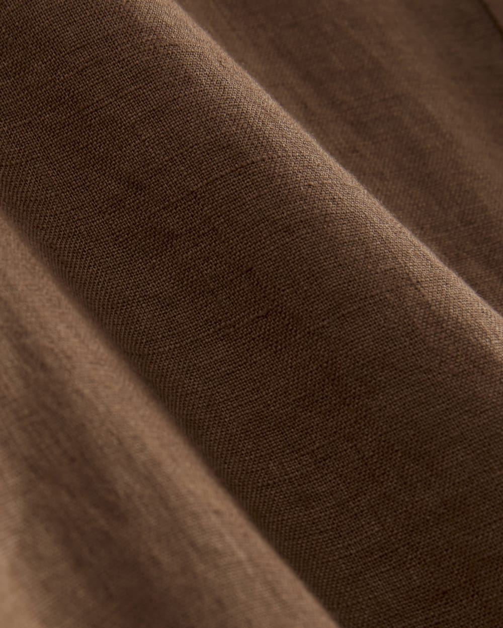 The Daytripper Dress in Linen in Cedarwood — detail view