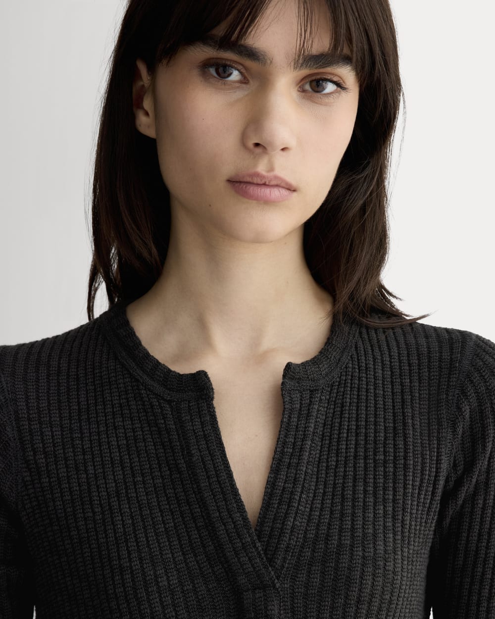 The Rib-Knit Henley Dress in Black — detail view