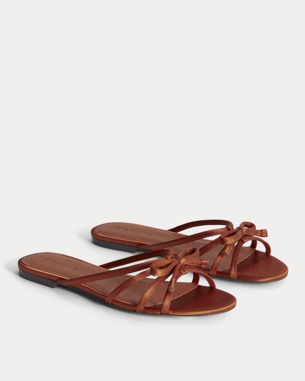 The Bow Sandal in Deep Amber Satin — detail view