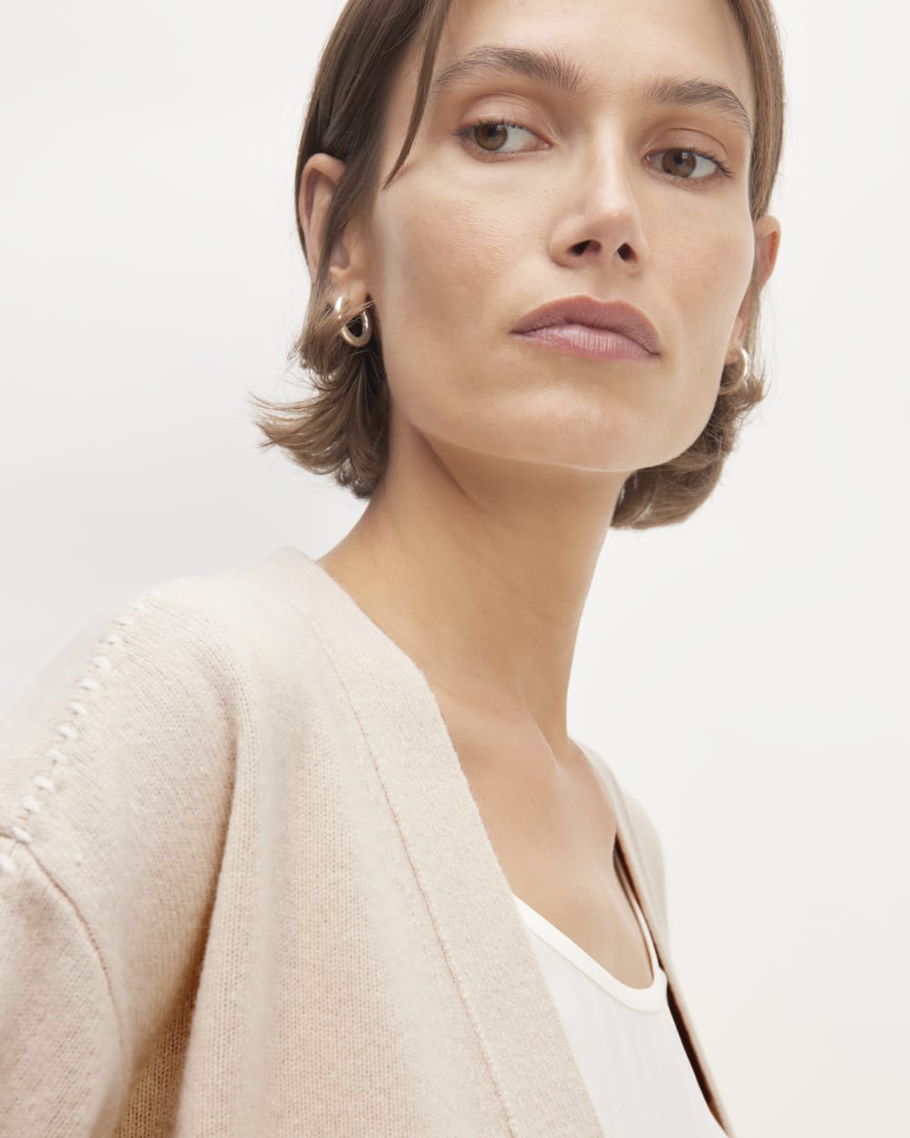 The Good Merino Wool Cardigan in Buttermilk / White — detail view