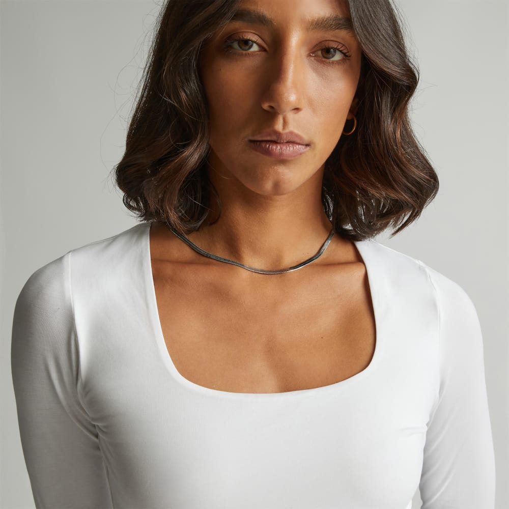 The Long-Sleeve Supima® Square-Neck Bodysuit in White — detail view