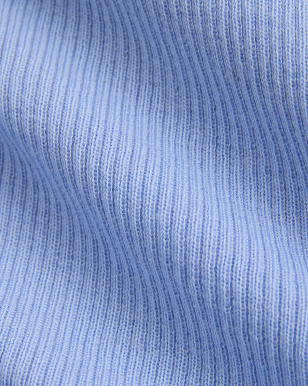 The Cardigan in Ultrasoft Merino in Open Air Blue — detail view
