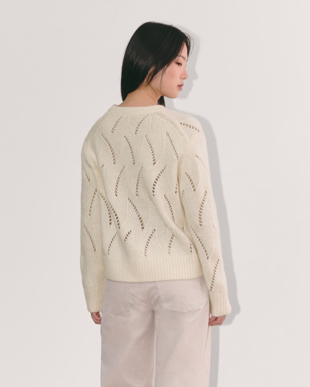 The Pointelle Sweater in Cloud in Bone — detail view