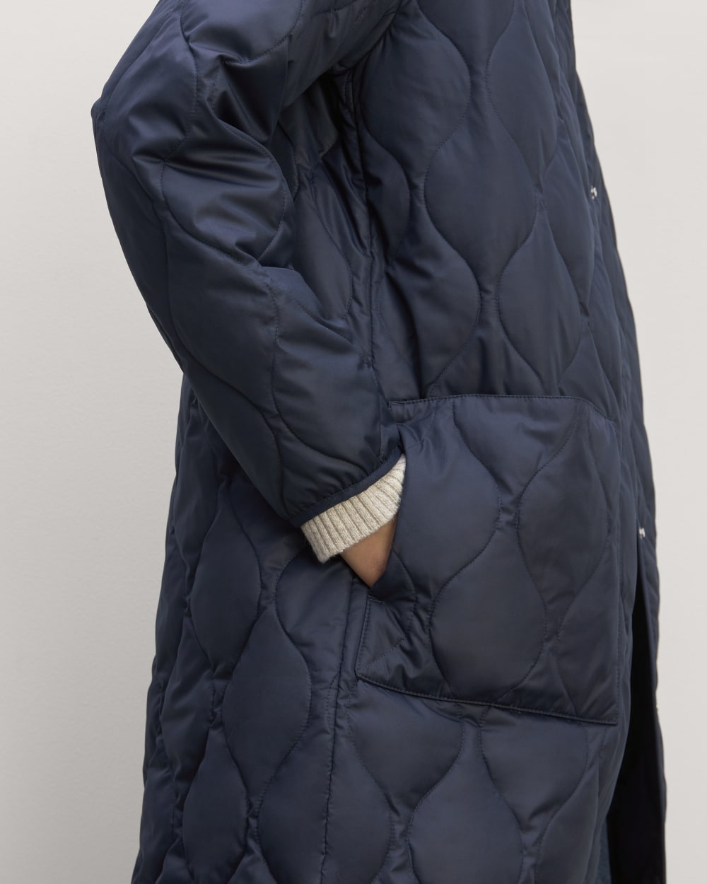 The Long Quilted Liner in Navy — detail view