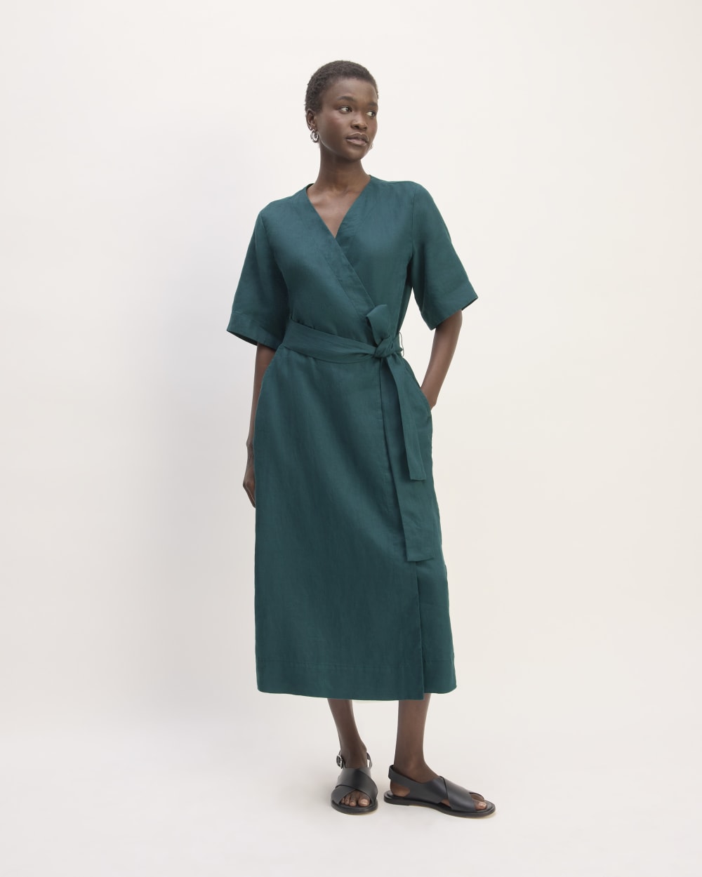 The Wrap Dress in Linen in Dark Sea — front view