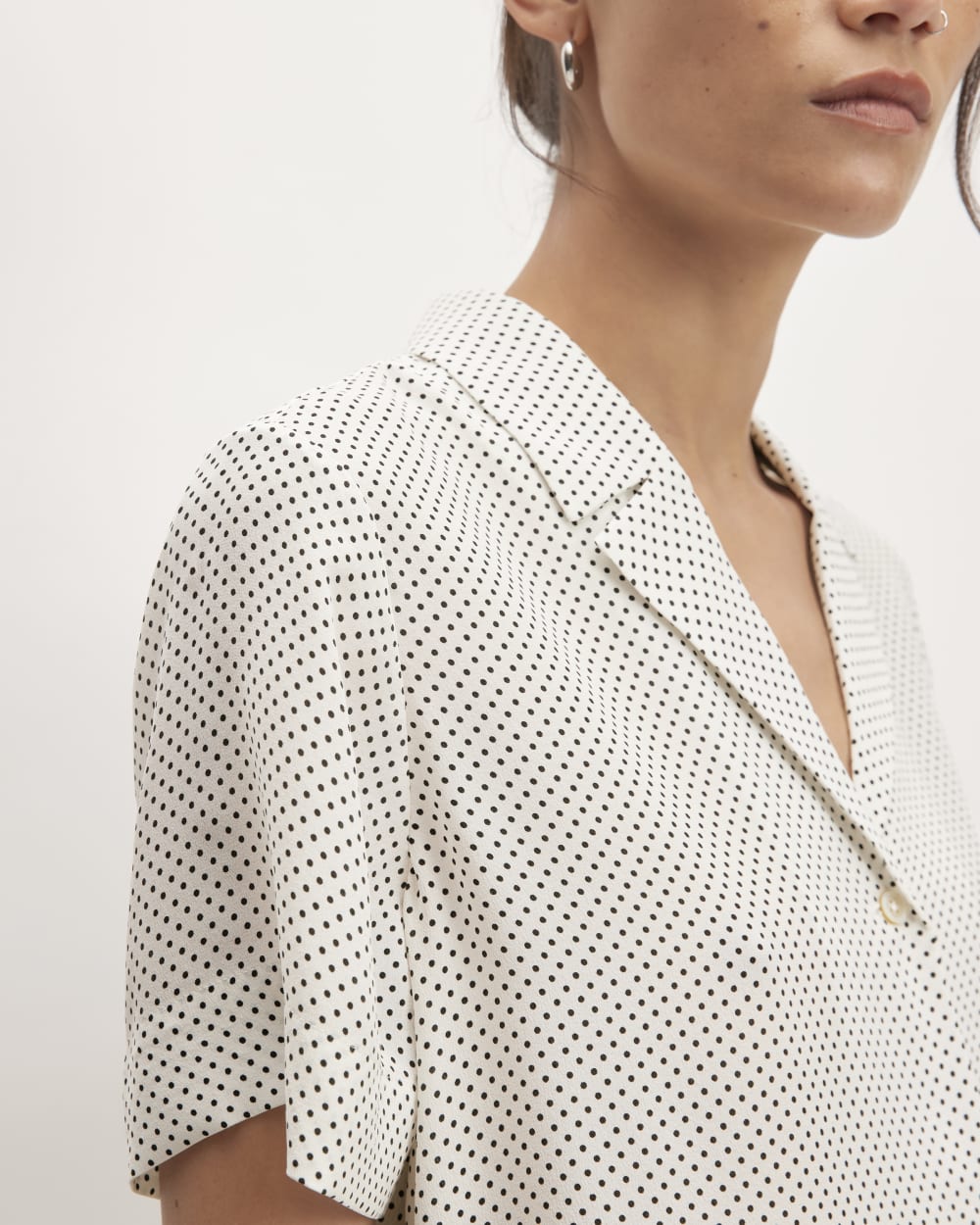 The Notch Shirt in Washable Silk in Bone / Black Polka Dot — detail view