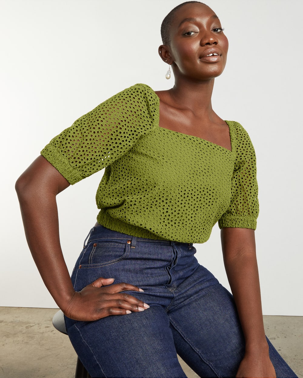 The Eyelet Puff Sleeve Top in Moss — detail view