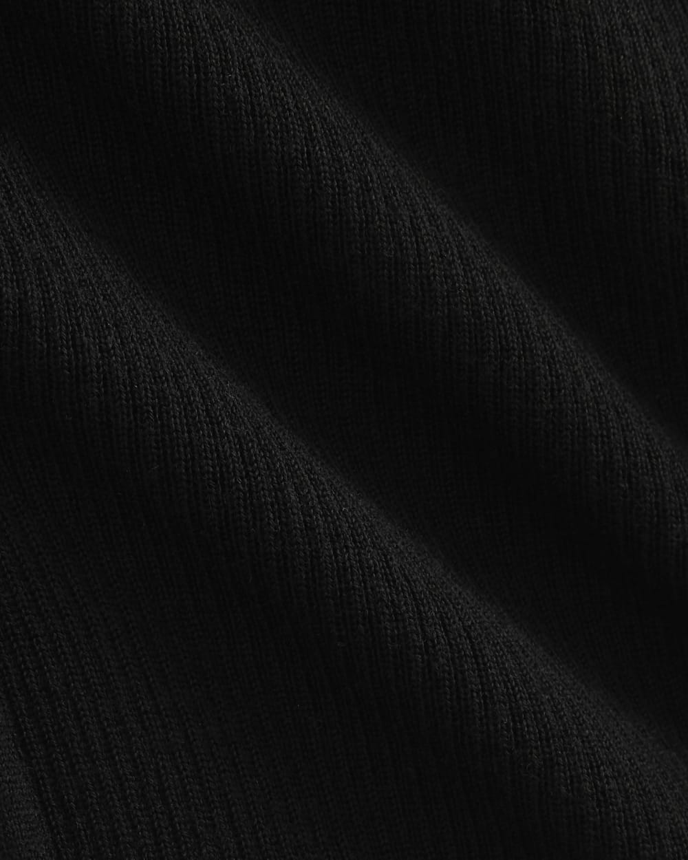 The Short-Sleeve Henley in Ultrasoft Merino in Black — detail view