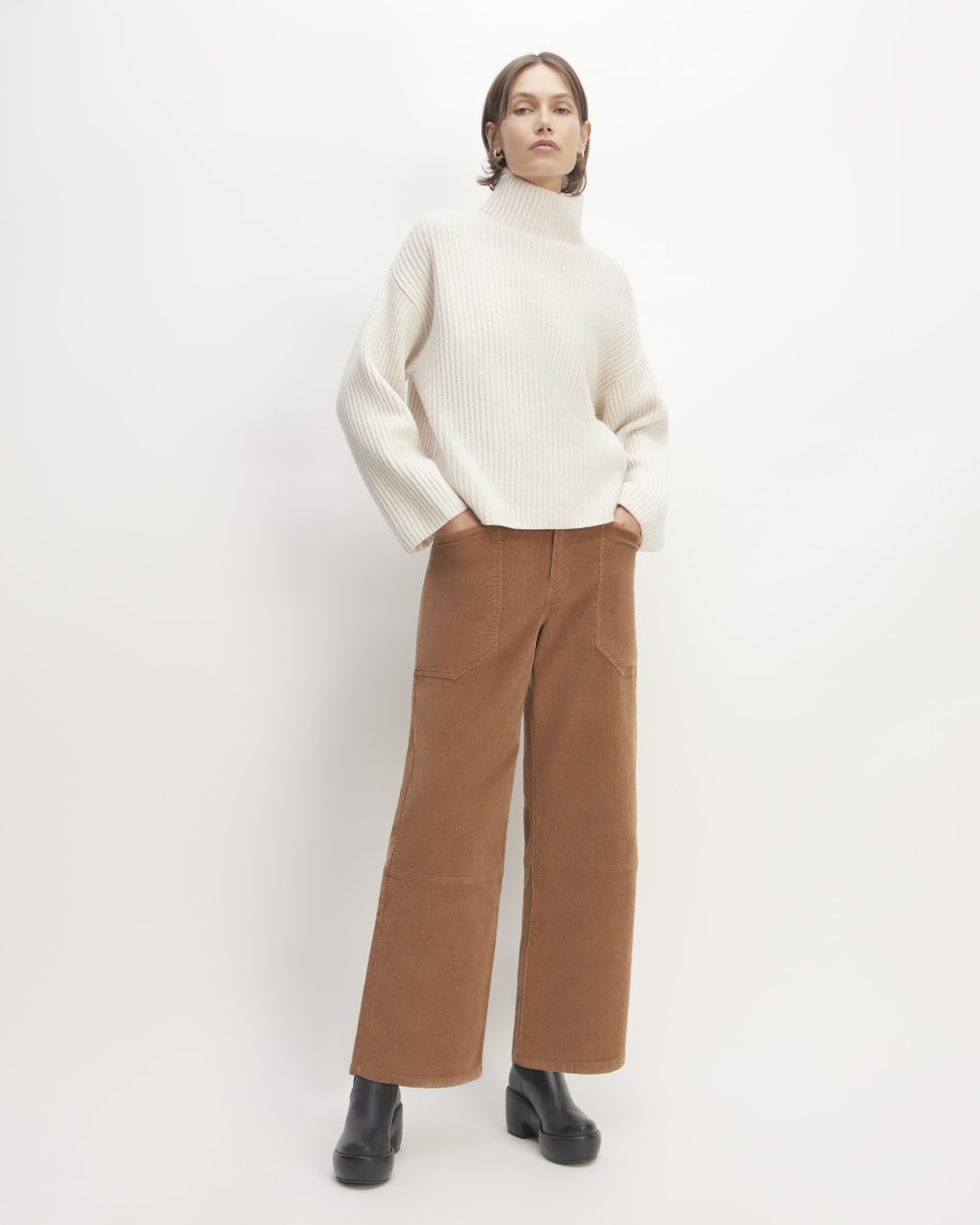 The Felted Merino Funnel-Neck Pullover in Heathered Oat — detail view