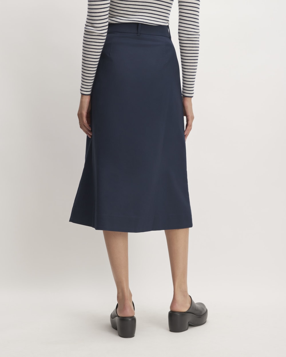 The Structured Cotton A-Line Skirt in Navy — detail view